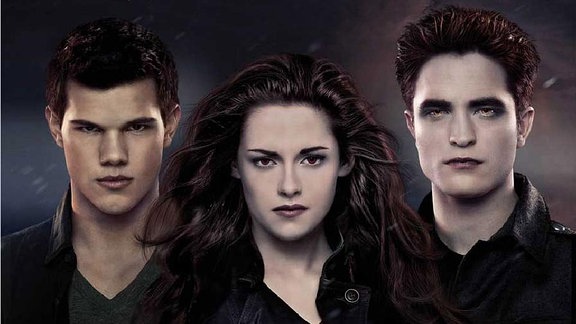 Twilight-Plakat: Eine Frau mit wehenden Haaren steht zwischen zwei Männern.